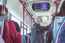 man in the bus, with mask