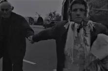 old men and women holding each others hands, black and white old picture