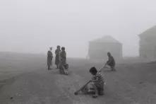 KIDS PLAYING IN THE MISTY VILLAGE