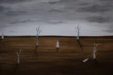 Deserted landscape with empty trees and a human figure.