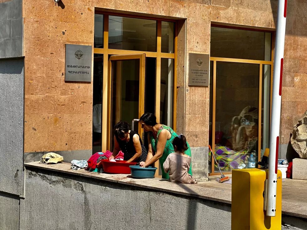 Women in front of the building