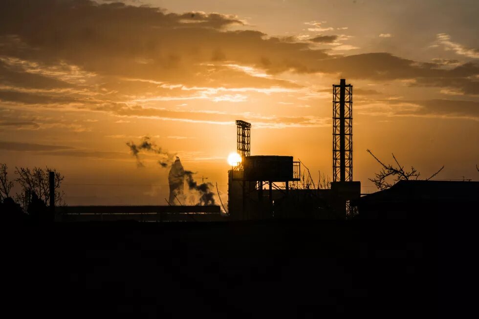 silhouette of building A sunset view from the industrial part of the city